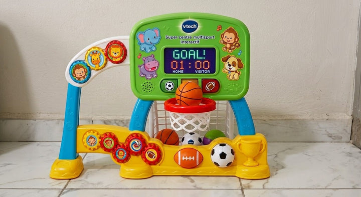 VTech Super Centre Multisport Interactif, a 2-in-1 sports toy center for toddlers combining soccer and basketball:
